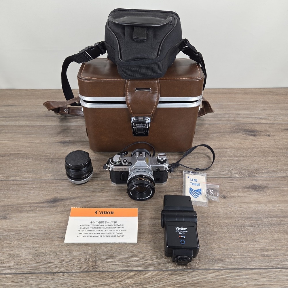 CANON AT-1 SLR 35mm Film Camera Untested w/ Lens' Case and Bag Vintage Clean